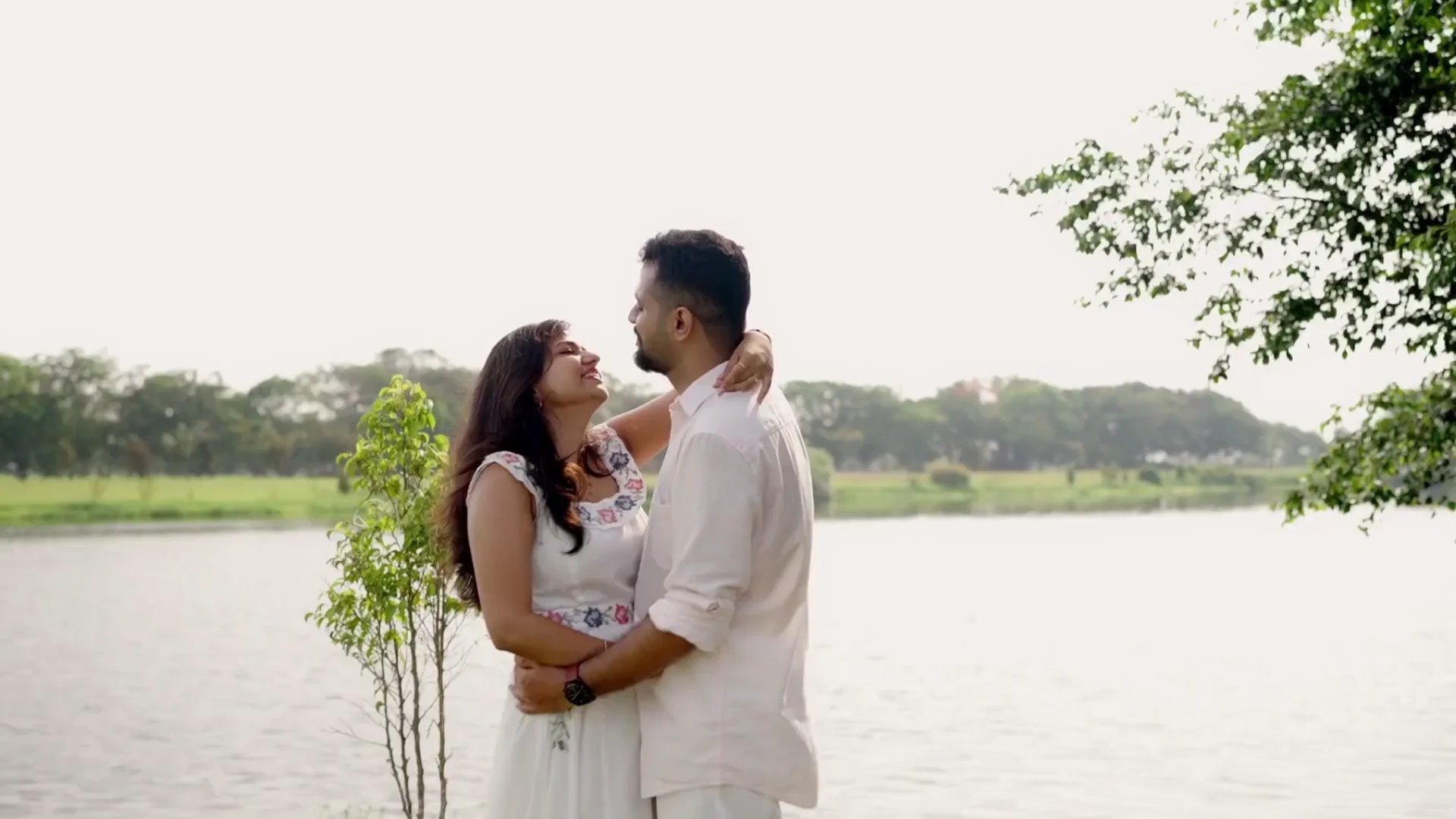 Aaron and Tinu sharing a joyful moment outdoors